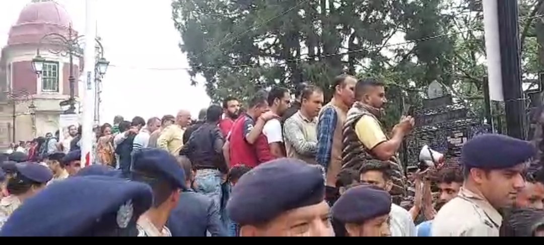 Taxi drivers and owners protest near Deputy Commissioner's office in Shimla